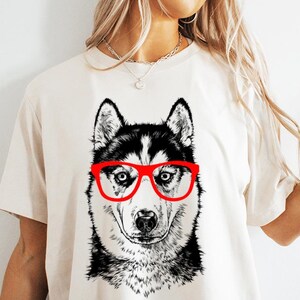 Funny and Cute Nerdy Dog Wearing Glasses shirt for Siberian Husky lovers! This Huskies Dog art tshirt, tank top, kids tee, youth or sweatshirt is a perfect gift for Siberian Husky Mom, Husky Dog Dad and Dog Lover.