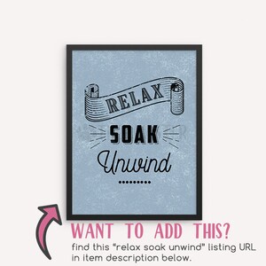 May include: A framed print with a blue background and black text that reads "RELAX SOAK Unwind". The text is in a vintage style font and is surrounded by a decorative scroll.