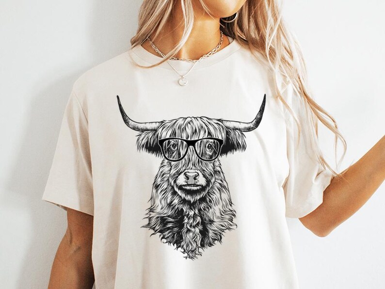 Funny and Cute Nerdy Highland Cow Wearing Glasses shirt for Animal lovers! This Scottish Highland Cow art tshirt, tank top, kids tee, youth or sweatshirt is a perfect gift for Highland Cattle Lover, and Farm Animal Lovers.