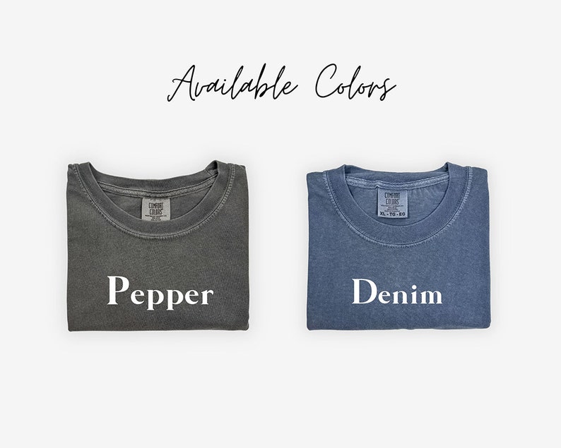 May include: Two folded t-shirts, one gray with the word "Pepper" and one blue with the word "Denim" printed on them. Available Colors.