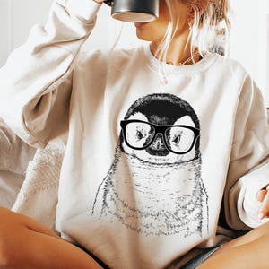 Funny and Cute Nerdy Animal Wearing Glasses shirt for Penguin lovers! This Penguin art tshirt, tank top, kids tee, youth or sweatshirt is a perfect gift for Penguin Lover and Animal Lovers.