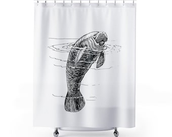 May include: A black and white line drawing of a manatee swimming in the water. The manatee is facing the viewer and has its mouth open.