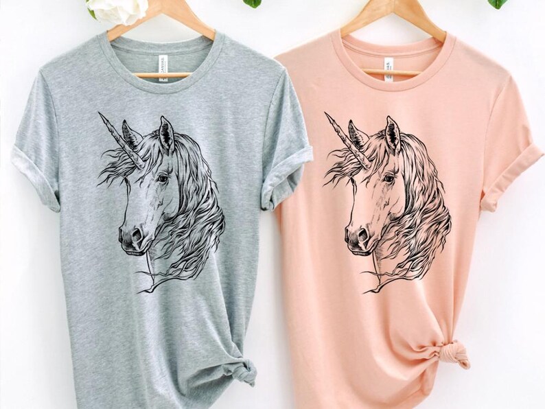 Funny and Cute Nerdy Unicorn Wearing Glasses shirt for Unicorn lovers! This Unicorn art tshirt, tank top, kids tee, youth or sweatshirt is a perfect gift for Unicorn Lover and Animal Lovers.