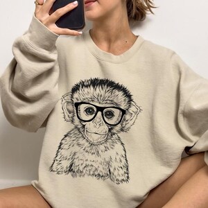 Funny and Cute Nerdy Safari Animal Wearing Glasses shirt for Monkey lovers! This Monkey art tshirt, tank top, kids tee, youth or sweatshirt is a perfect gift for Monkey Lover and Wild Animal Lovers.