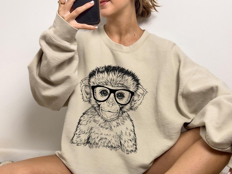 Funny and Cute Nerdy Safari Animal Wearing Glasses shirt for Monkey lovers! This Monkey art tshirt, tank top, kids tee, youth or sweatshirt is a perfect gift for Monkey Lover and Wild Animal Lovers.