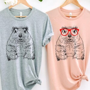 Funny and Cute Nerdy Animal Wearing Glasses shirt for Groundhog lovers! This Groundhog art tshirt, tank top, kids tee, youth or sweatshirt is a perfect gift for Groundhog Day, Woodchuck Lover and Animal Lovers.