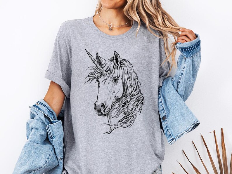 Funny and Cute Nerdy Unicorn Wearing Glasses shirt for Unicorn lovers! This Unicorn art tshirt, tank top, kids tee, youth or sweatshirt is a perfect gift for Unicorn Lover and Animal Lovers.