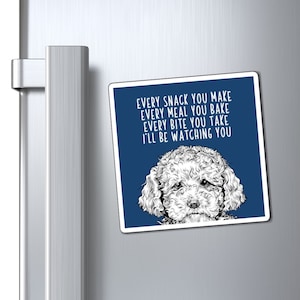 May include: A blue and white refrigerator magnet with a black and white illustration of a dog. The text on the magnet reads "EVERY SNACK YOU MAKE EVERY MEAL YOU BAKE EVERY BITE YOU TAKE I'LL BE WATCHING YOU".