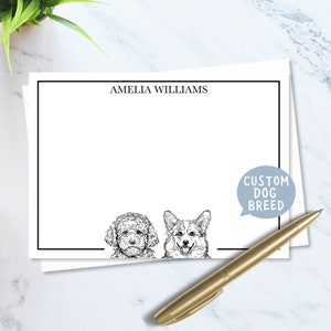 May include: A white card with black text that reads "Amelia Williams" at the top. The card has a black border and a speech bubble with the text "Custom Dog Breed" in blue. The card features a black and white illustration of a poodle and a corgi.