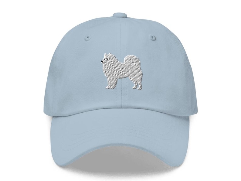 This embroidered Samoyed hat is a perfect gift for dog dad, dog mom, Samoyed lovers, and dog owner. Whether it's a Samoyed beanie, vintage distressed hat, denim hat, corduroy hat or dad hat, it's a cute and funny way to show off your love for your Samoyed dog.