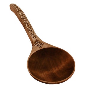 Hand carved spoon with a Celtic pattern