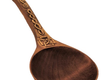 Hand carved spoon with a Celtic pattern