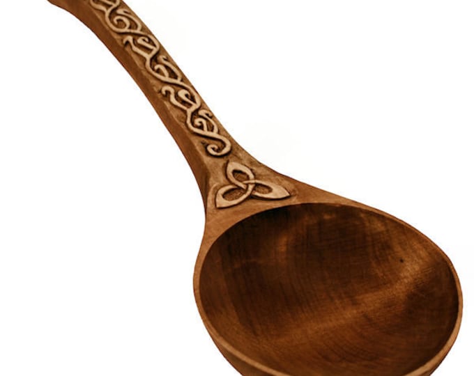 Hand carved spoon with a Celtic pattern