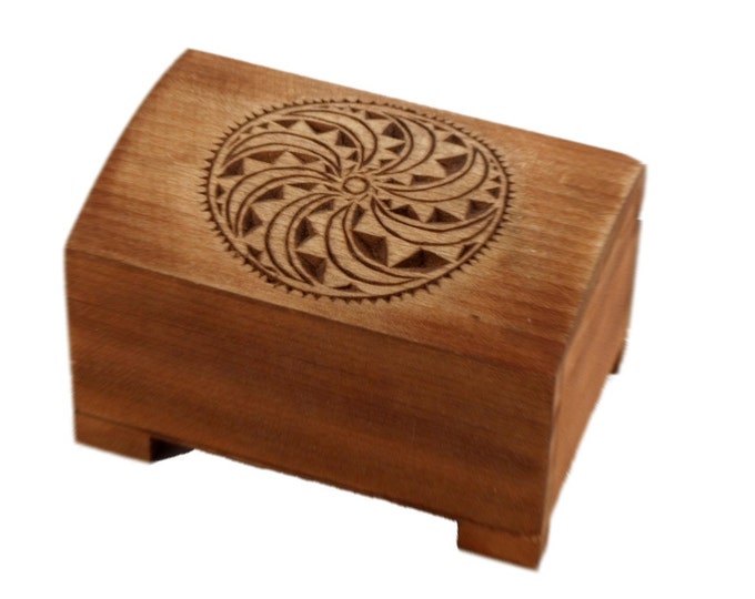 wooden historical jewelry box with solar symbol