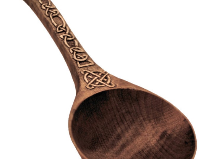 Hand carved spoon with a Celtic pattern