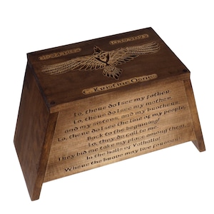 May include: A wooden box with a carved eagle design and the dates 09,94,1954 and 10,19,2022. The box is inscribed with the name C. Kristine Osnes and a poem about seeing family in the afterlife.