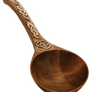 Hand carved spoon with a Celtic pattern