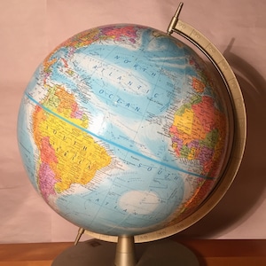 Globemaster 12 Inch Diameter Globe on Gold Painted Metal Stand