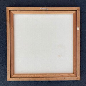 May include: A wooden frame with a white canvas inside. The frame is made of natural wood with a light brown colour. The canvas is stretched tightly over the frame and is ready for painting.