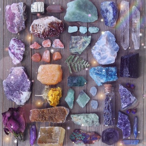 Flat lay grid display of various crystals, stones, herbs, and flowers in a plethora of colors and textures. This listing includes 6 rough stones measuring at least 1 inch each similar to those pictured here.