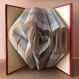Double heart with number Folded book art