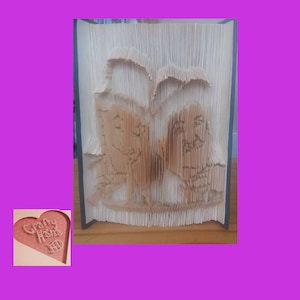 May include: A book with pages folded to create a 3D owl design. The owl is brown and sits on a branch. The book is displayed against a purple background. A heart-shaped card with the text "Crafty Home" is in the lower left corner.