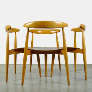 Satz aus vier dänischen HerzEsszimmerstühlen aus Buche und Teakholz, FH4103, von Hans J. Wegner für Fritz Hansen, 1950er Jahre Bild 1