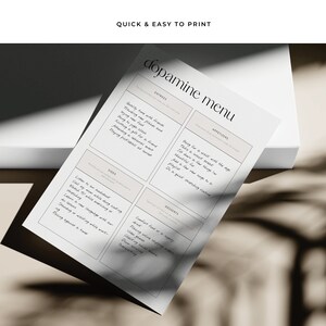 Peut inclure: Un menu dopamine imprimable avec un fond blanc et du texte noir. Le menu est divis&eacute; en quatre sections&nbsp;: Entr&eacute;es, Ap&eacute;ritifs, Accompagnements et Desserts. Chaque section liste des activit&eacute;s qui peuvent augmenter le niveau de dopamine, comme "Cuisiner une nouvelle recette" et "&Eacute;couter un livre audio".
