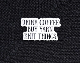 May include: White sticker with black text that reads "Drink Coffee. Buy Yarn. Knit Things."