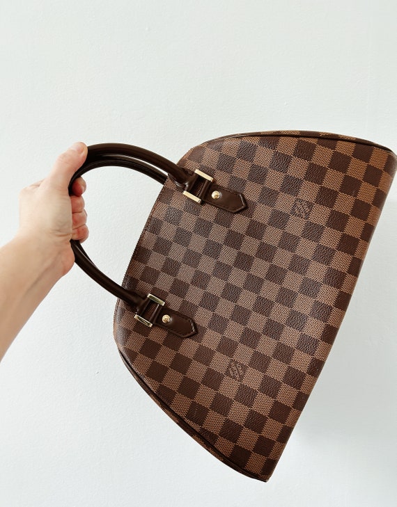 Buy Pre-owned & Brand new Luxury Louis Vuitton Rivera MM Damier Handbag  Online