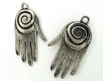 Hand with Spiral Design Pendant, a motif found in Southwestern prehistoric petroglyph designs, priced in pairs of one LF and one RF hand