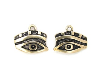 Egyptian Eye Small Jewelry Charm, a pair of charms in the shape of hieroglyphic image signs representing LF and RF eyes outlined with paint