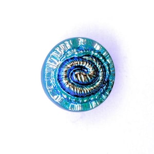 Spiral Design Molded Glass Button with green clear glass base and an iridescent surface finish.