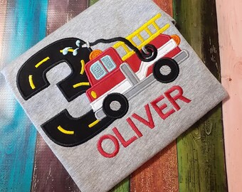 Firetruck birthday shirt, Appliqued, monogrammed with child's name and age.  100% cotton T-shirt.  Your choice of colors.