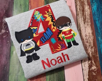 Super Hero Duo Birthday T-shirt.  Machine Embroidery and Applique with superhero and child's name and age in your choice of colors.