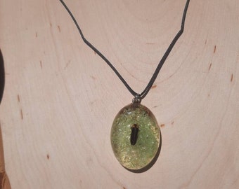 Real cruelty free handmade oval shaped glow in the dark lightning bug necklace