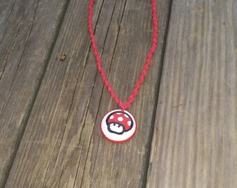 Wooden hand painted red mario mushroom necklace