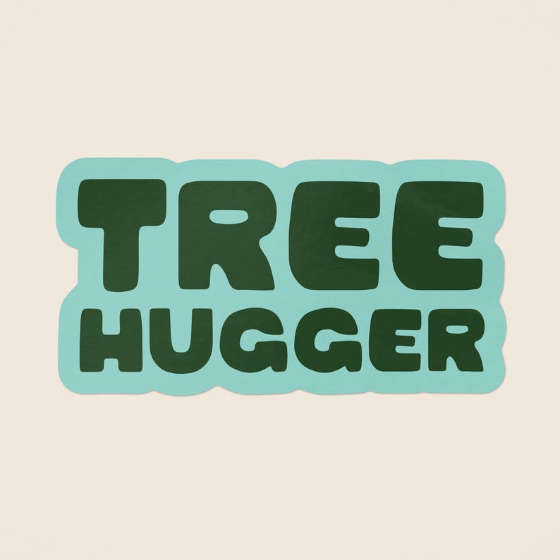 May include: A light blue sticker with the text "TREE HUGGER" in dark green letters.