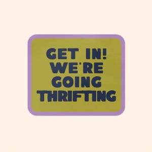Bright green rectangular shaped sticker with rounded corners and purple border that says 'Get In! We're Going Thrifting!' and on a cream colored background
