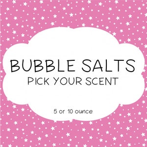 May include: Pink background with white stars. A white cloud shape with the text "BUBBLE SALTS PICK YOUR SCENT" and "5 or 10 ounce".