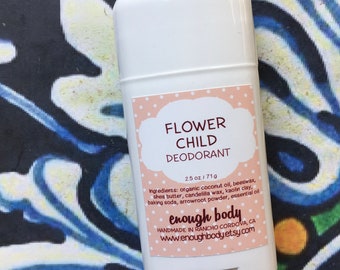 Puede incluir: Barra de desodorante blanca con una etiqueta rosa y blanca que dice "FLOWER CHILD DEODORANT" y "enough body". La etiqueta también incluye los ingredientes y el texto "HANDMADE IN RANCHO CORDOVA, CA" y "www.enoughbody.etsy.com".