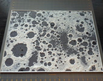 Tastbare puzzel van 3D-oppervlak maanlandschap