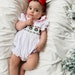 James & Lottie Baby Girls Red Velvet Smocked Christmas Nutcracker Mila Bubble main image 1