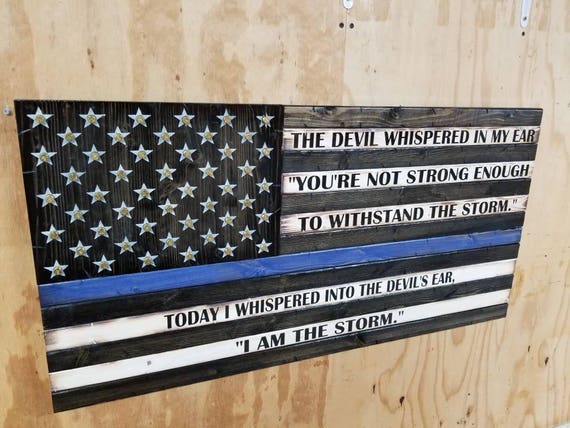 Wooden Rustic-Style American Flag w/ "I AM THE STORM" quote and Shell Casings in Stars