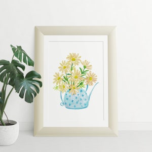 May include: A watercolor painting of a blue teapot with white polka dots filled with a bouquet of yellow daisies.