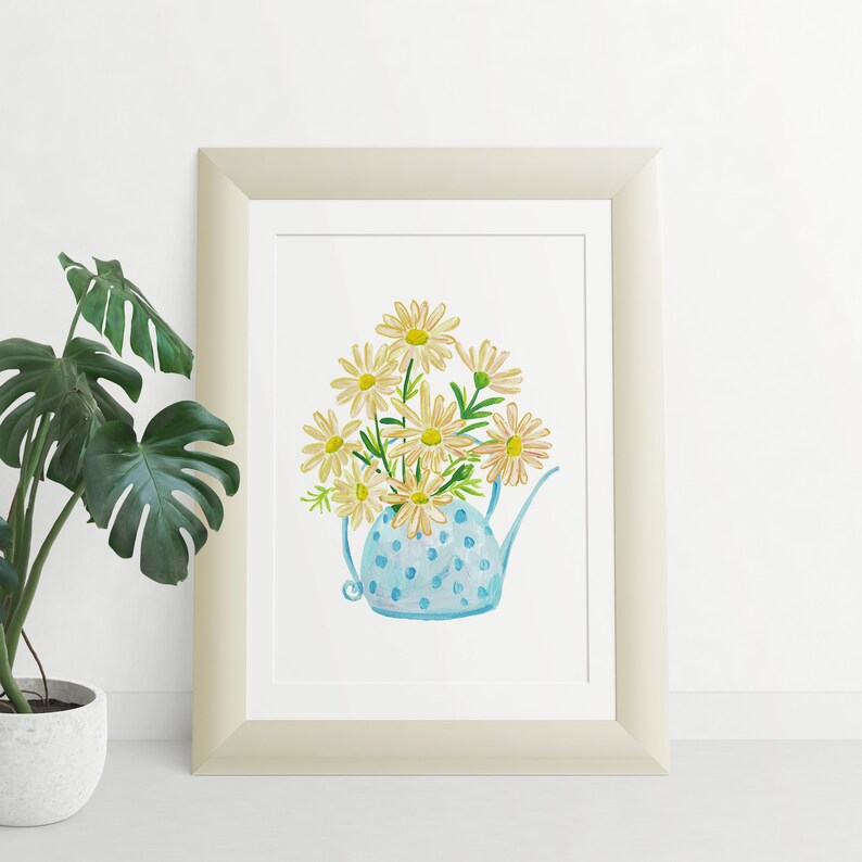 May include: A watercolor painting of a blue teapot with white polka dots filled with a bouquet of yellow daisies.