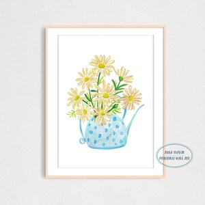 May include: A blue polka dot watering can with a white handle filled with a bouquet of white daisies.