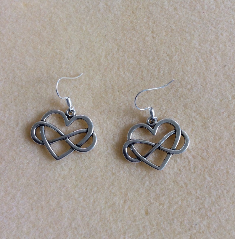 in silver metal endless love Infinity love earrings heart