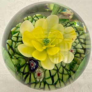 Large, Midcentury, Art Glass Paperweight, Murano Style, Water Lilies On A Bed Of Millefiore Flowers, 4 Inches Diameter, 850 grams.