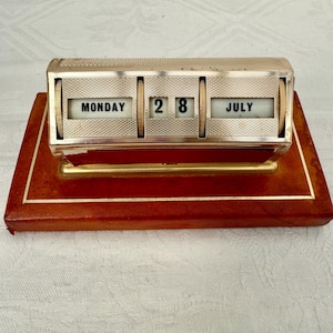 Midcentury Engine Turned Metal, Perpetual Desk Calendar With Faux Leather   Covered Base.